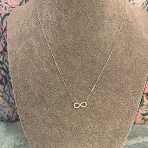 Delicate Infinity Pendant Necklace in Sterling Silver & Rhodium Plating.